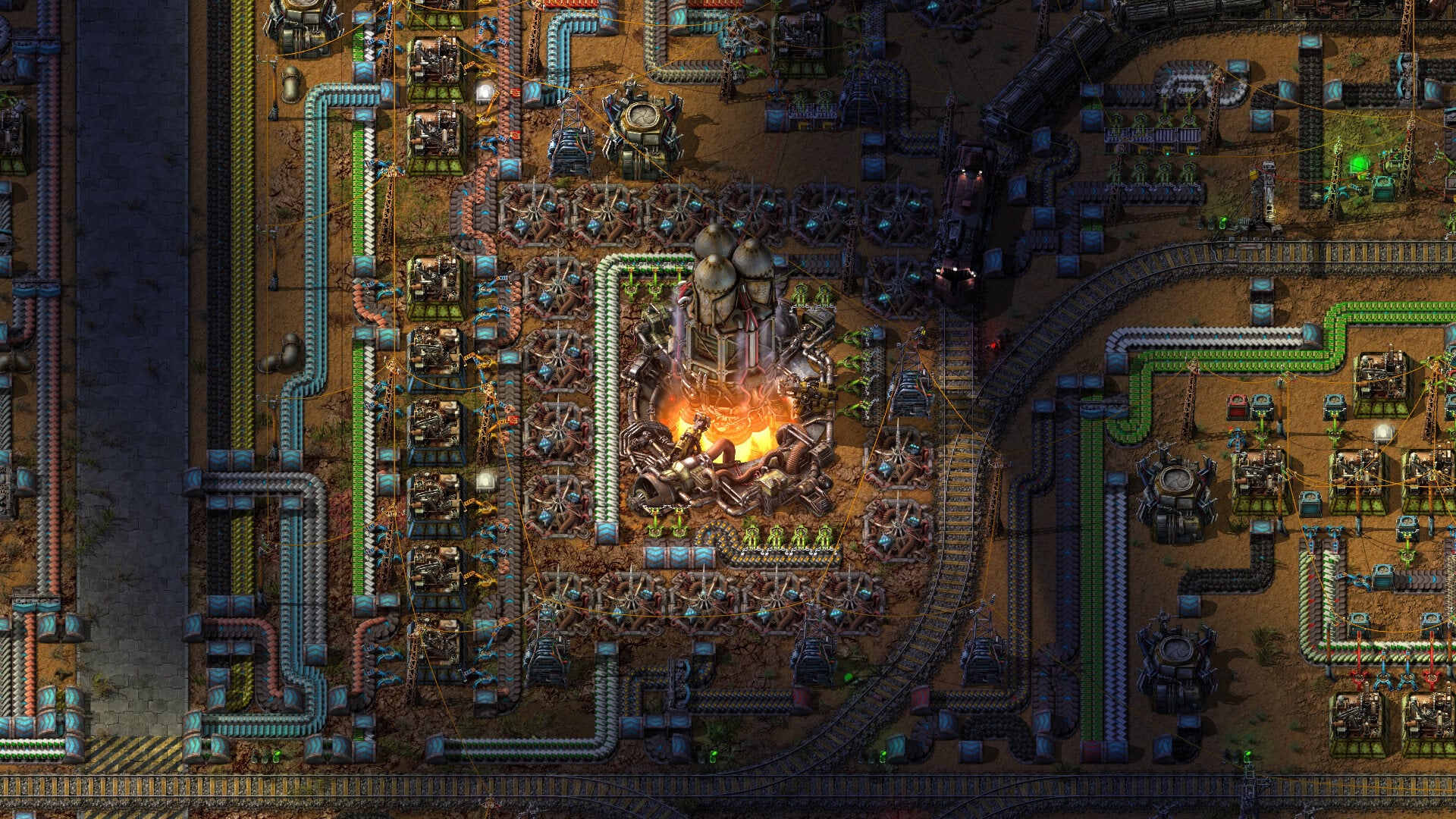 Factorio automation belts, trains, and factory sprawl