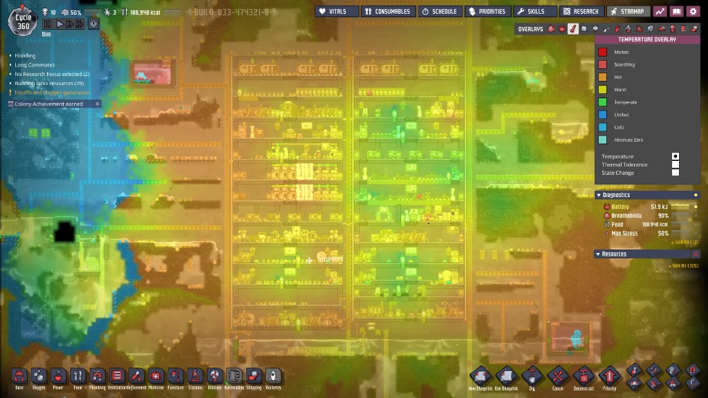 Oxygen Not Included Temperature Overlay of a large colony at Cycle 360, with the central living and industrial areas yellow and lime green from heat while cooler blue and green rock surrounds them