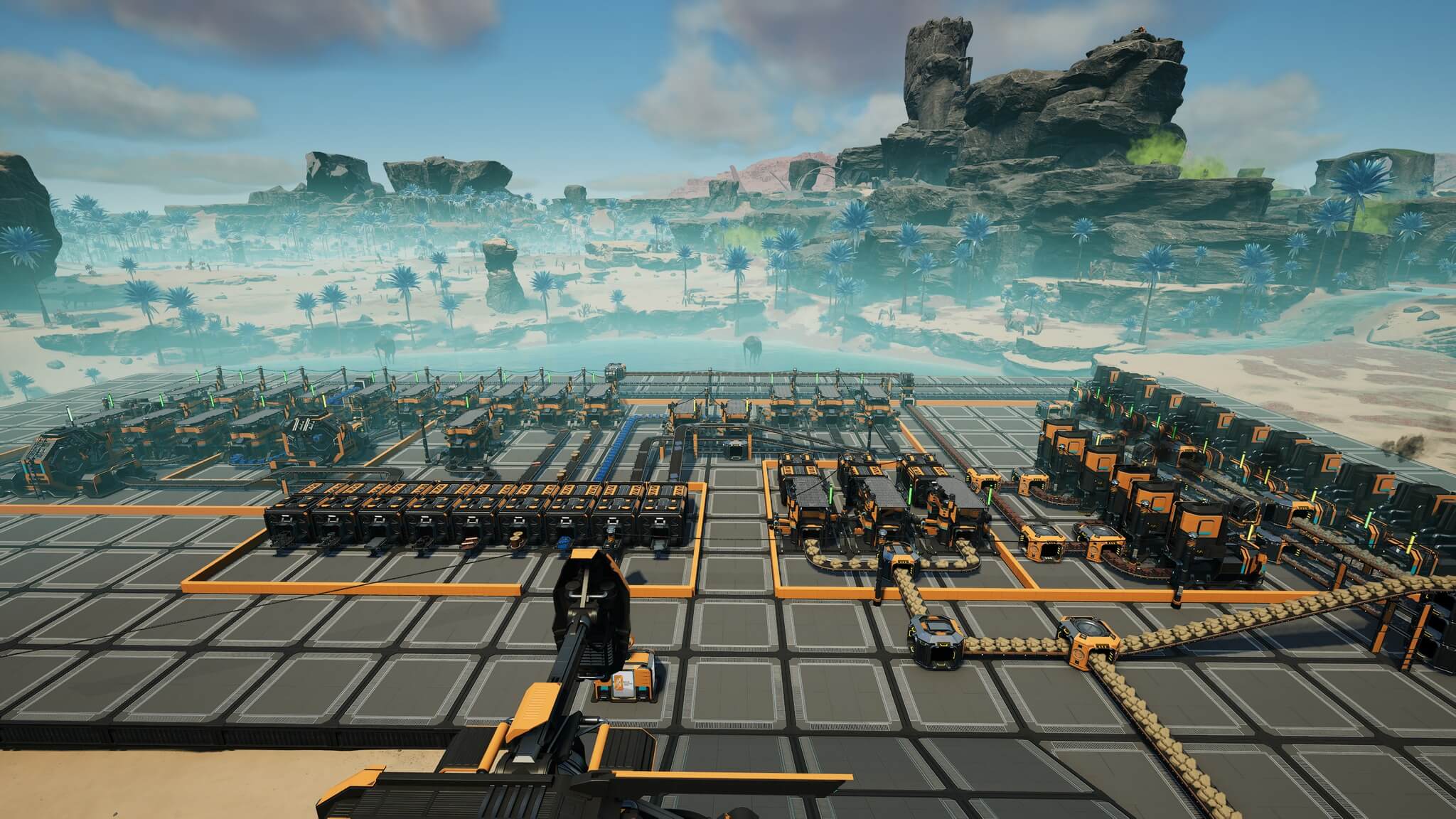 Satisfactory starter factory on foundations in a wide alien desert landscape